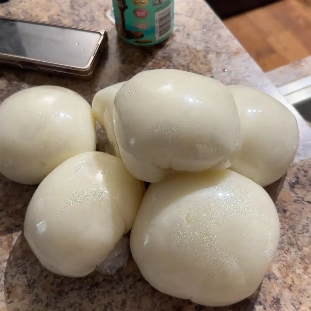 6 wraps of Poundo yam on a kitchen slab, with a phone and can of Arizona iced tea in the background.